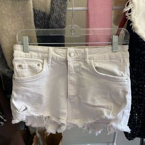 Zara white distressed jean shorts.